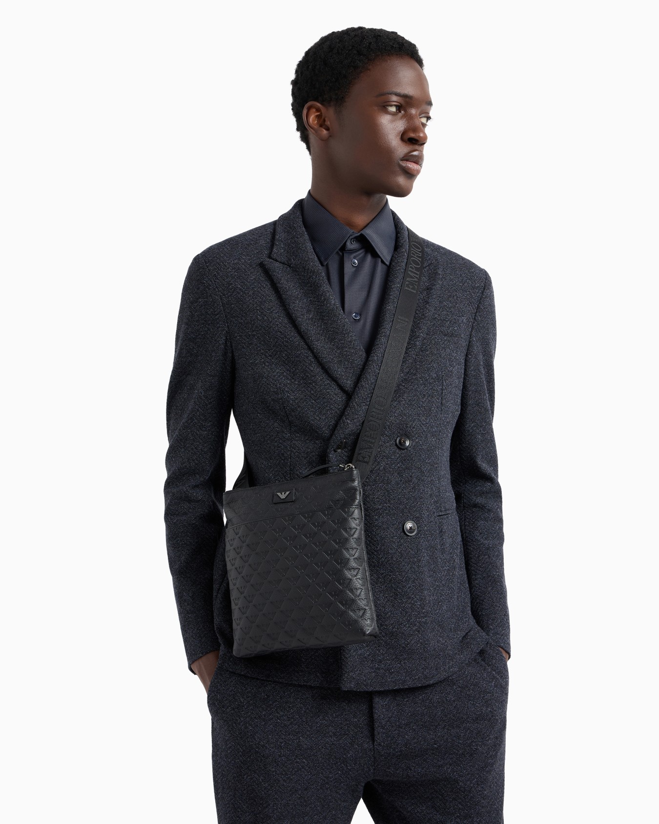Flat leather shoulder bag with all-over embossed eagle Slide 5
