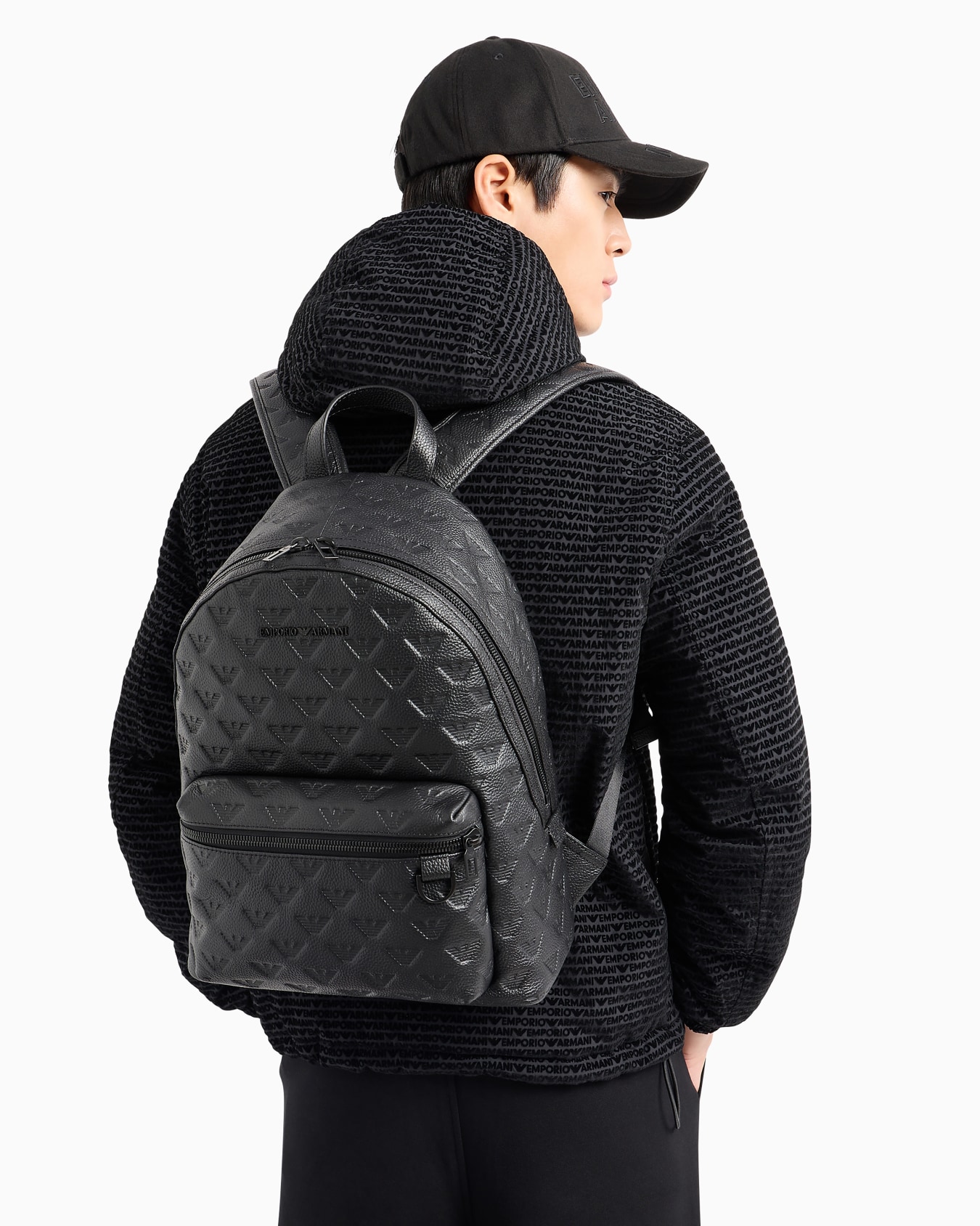 Round leather backpack with all-over embossed eagle Slide 5