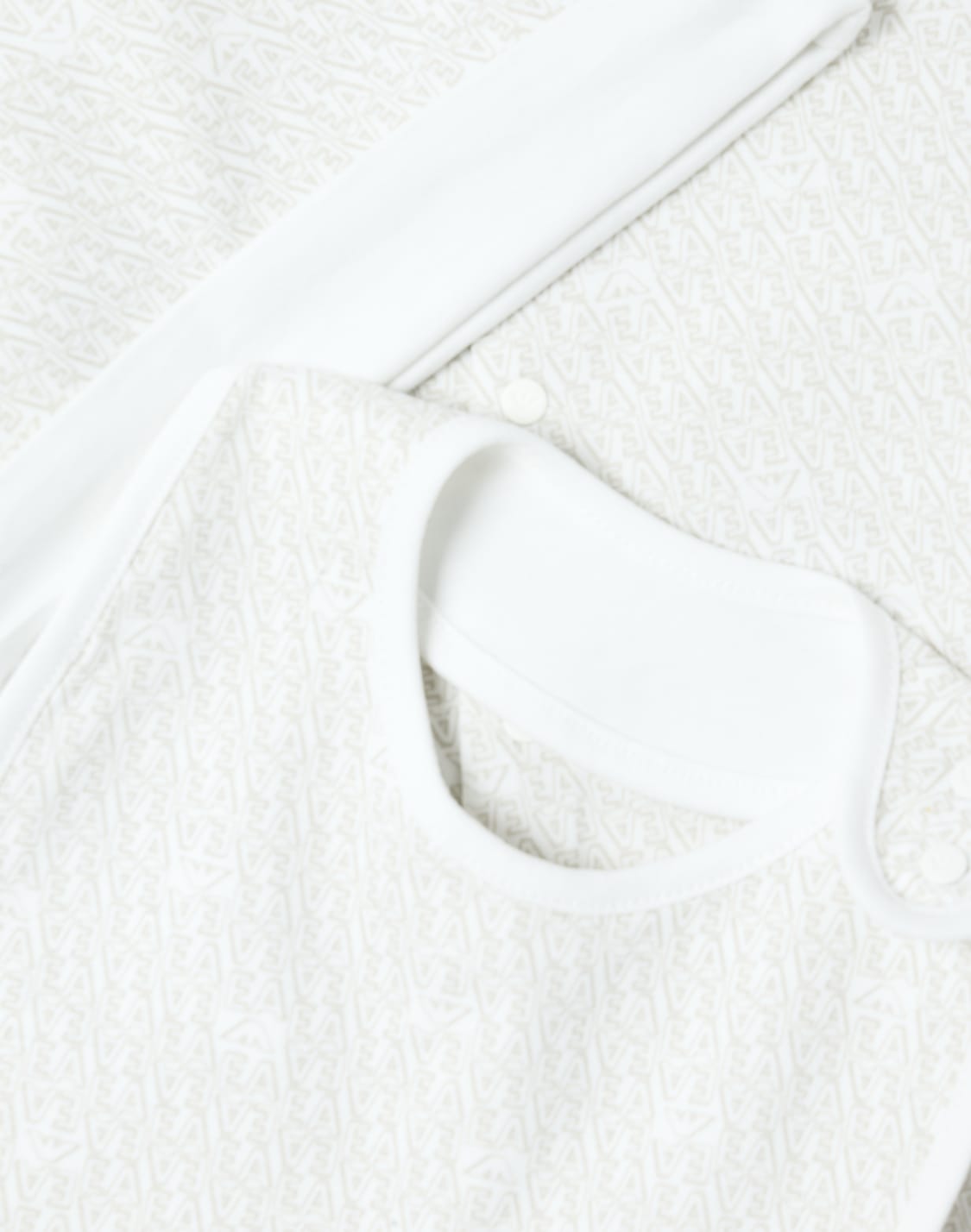 bib-and-cap-set-in-all-over-ea-logo-jersey-beige--emporio-armani