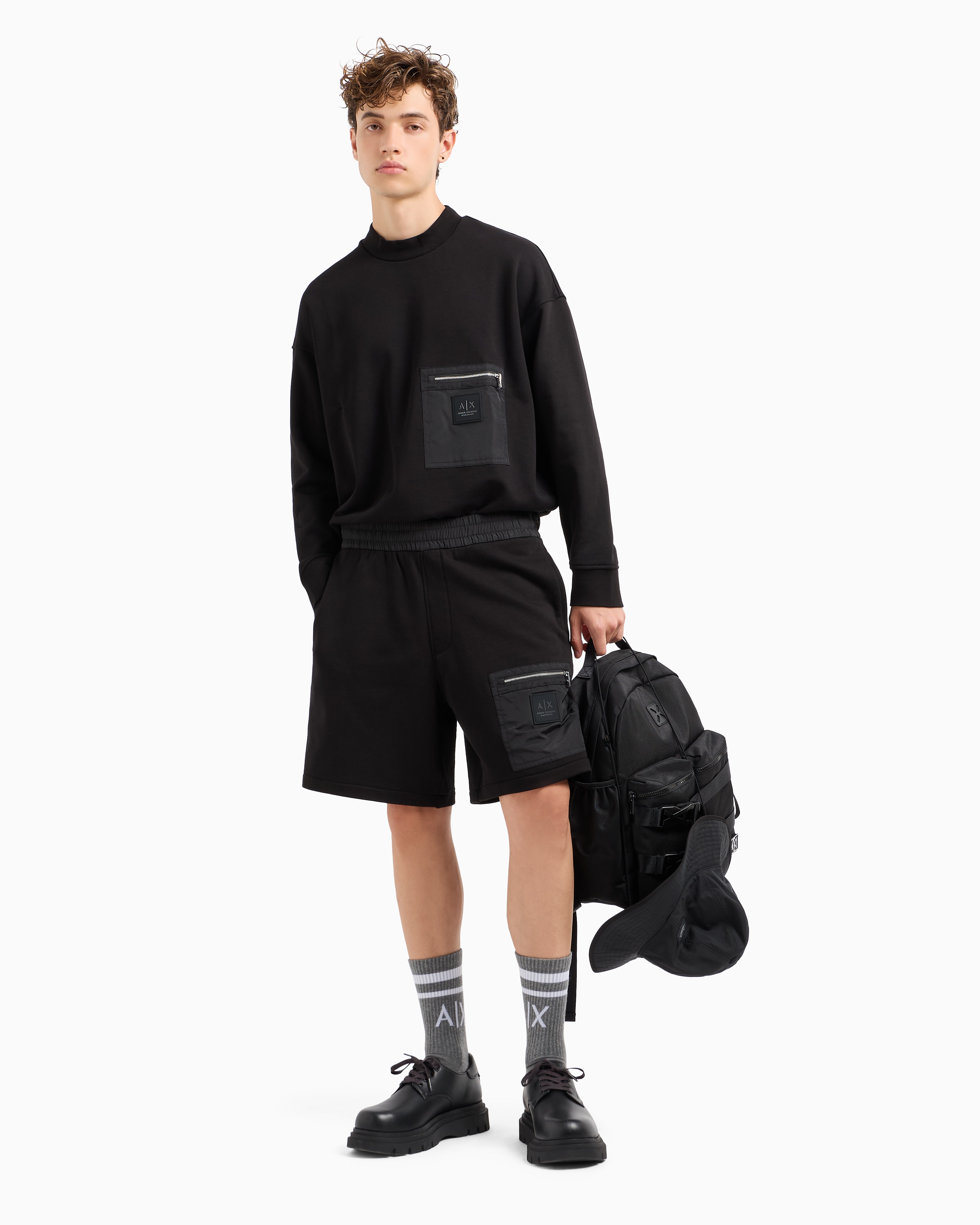 Crewneck sweatshirt with zip-up pocket