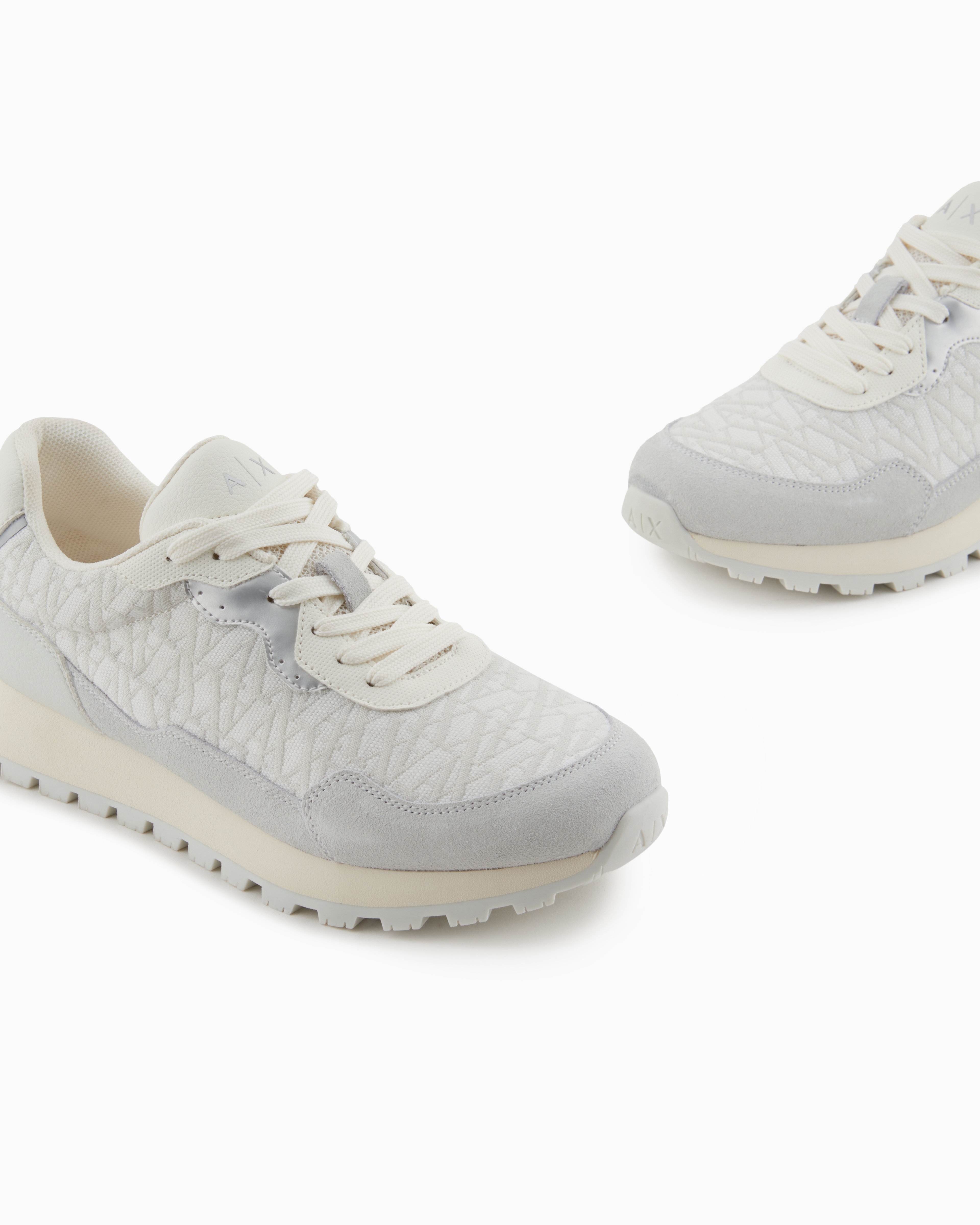 Sneakers with allover logo inserts