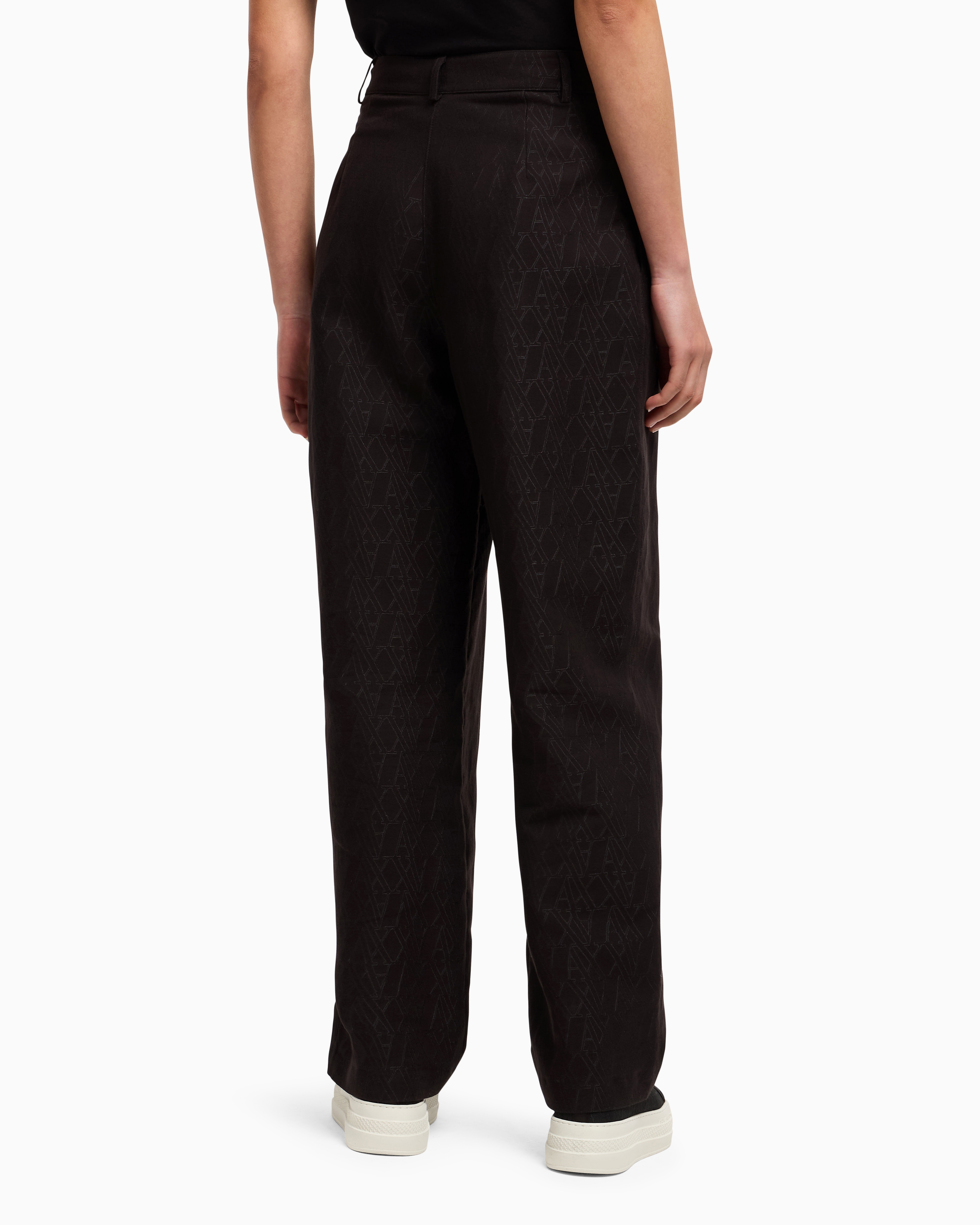 Pleated trousers with allover logo