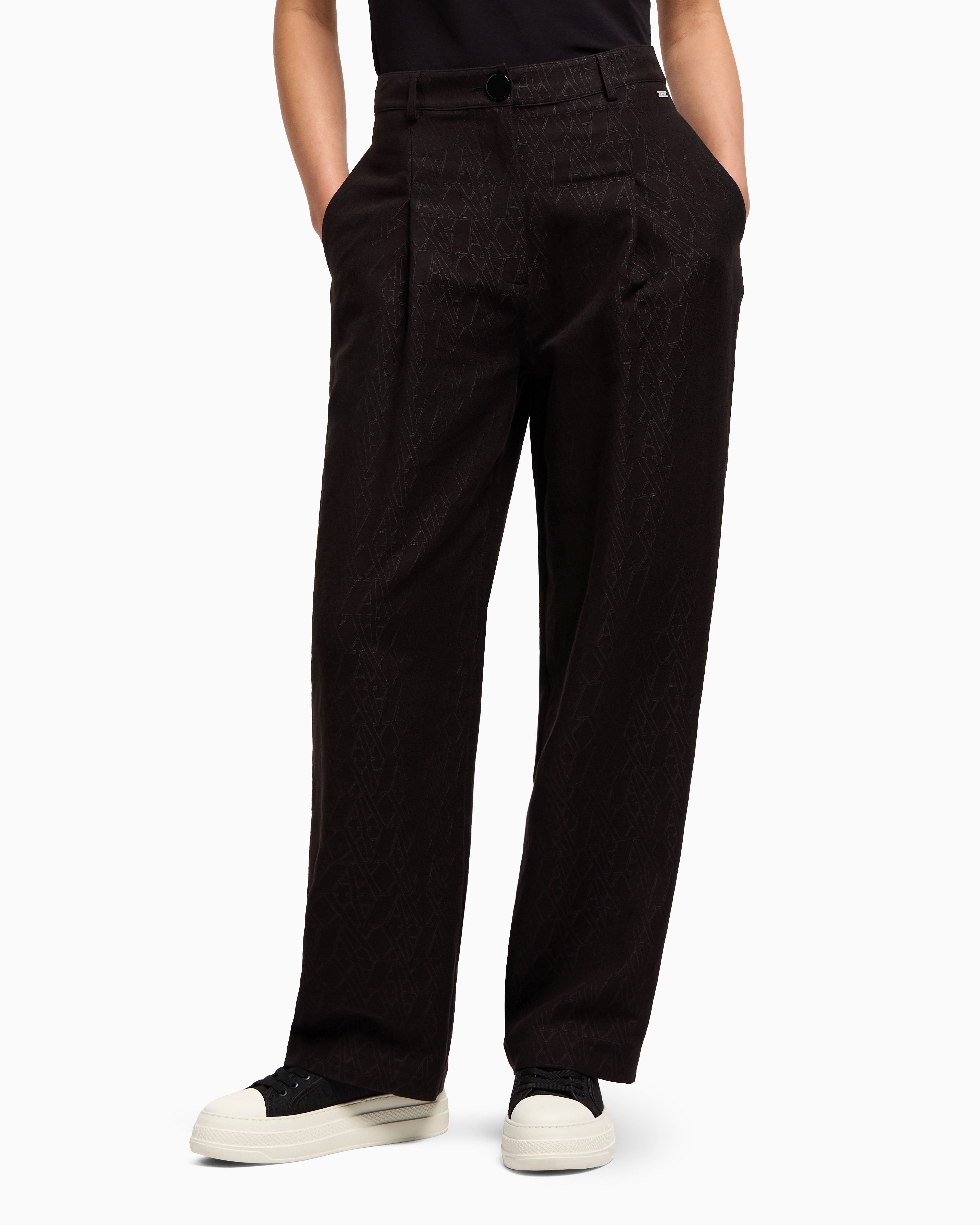 Pleated trousers with allover logo