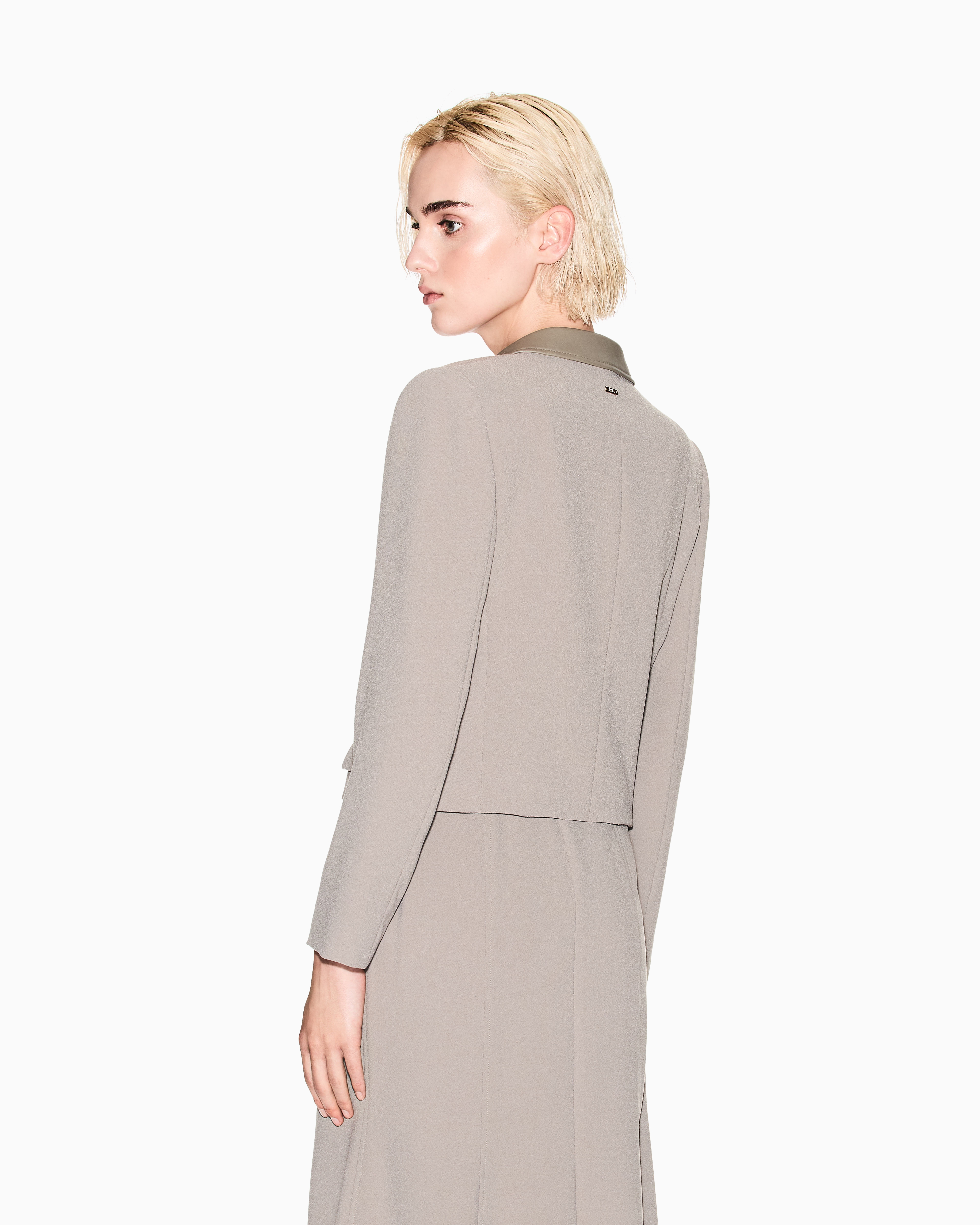 Short jacket with metal details