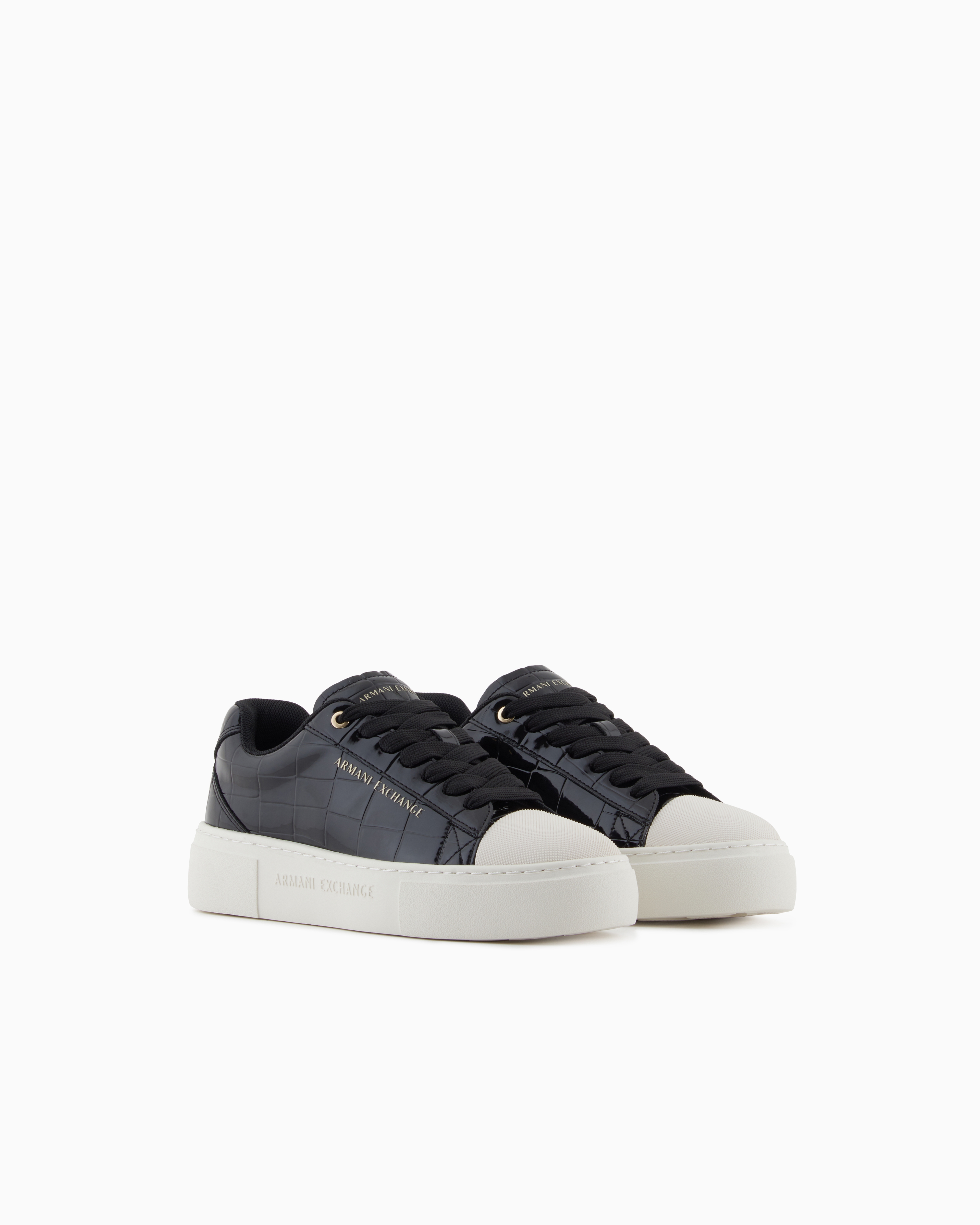 Sneakers with shiny crocodile-effect upper