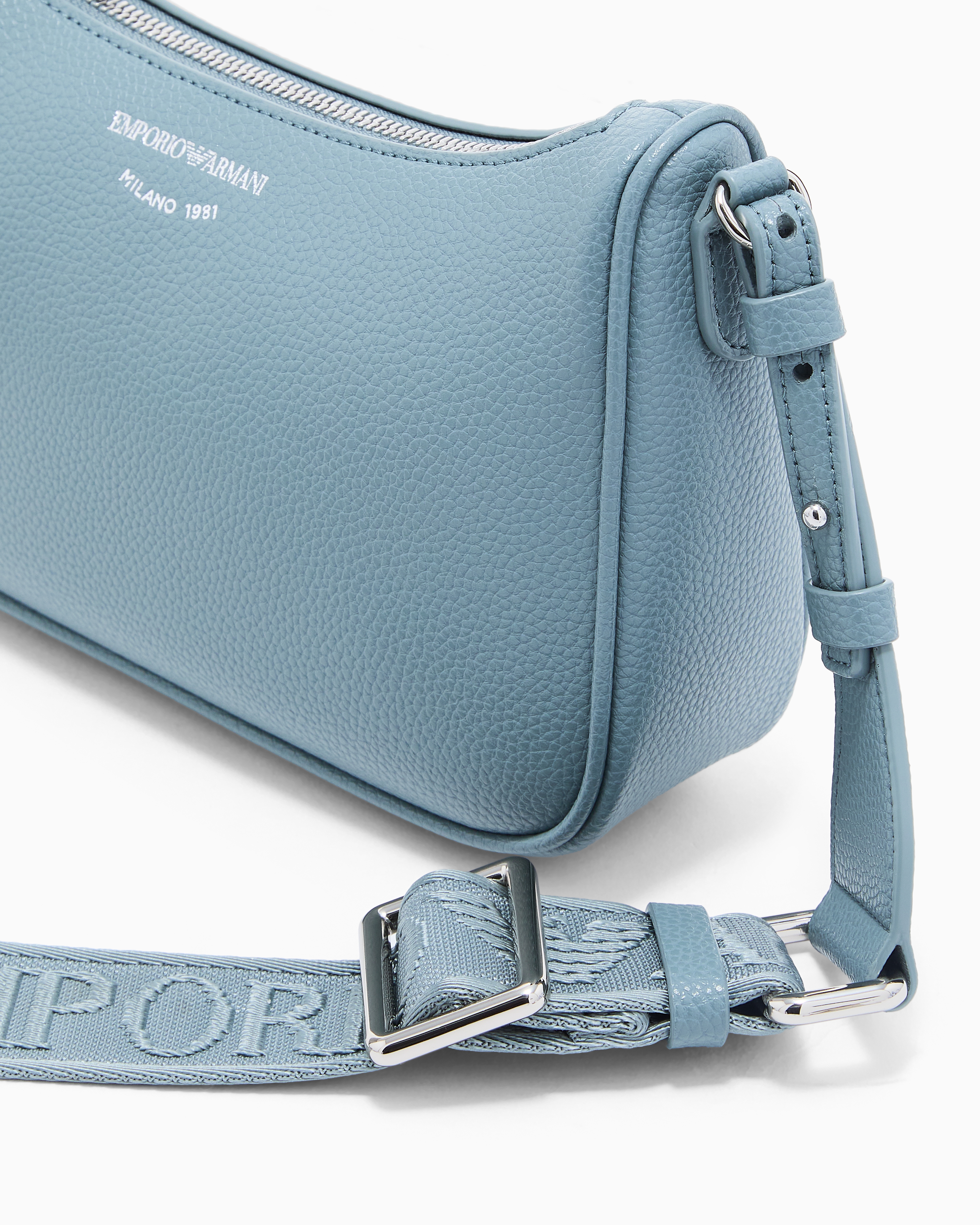 Pebbled shoulder bag with a zip closure and adjustable strap