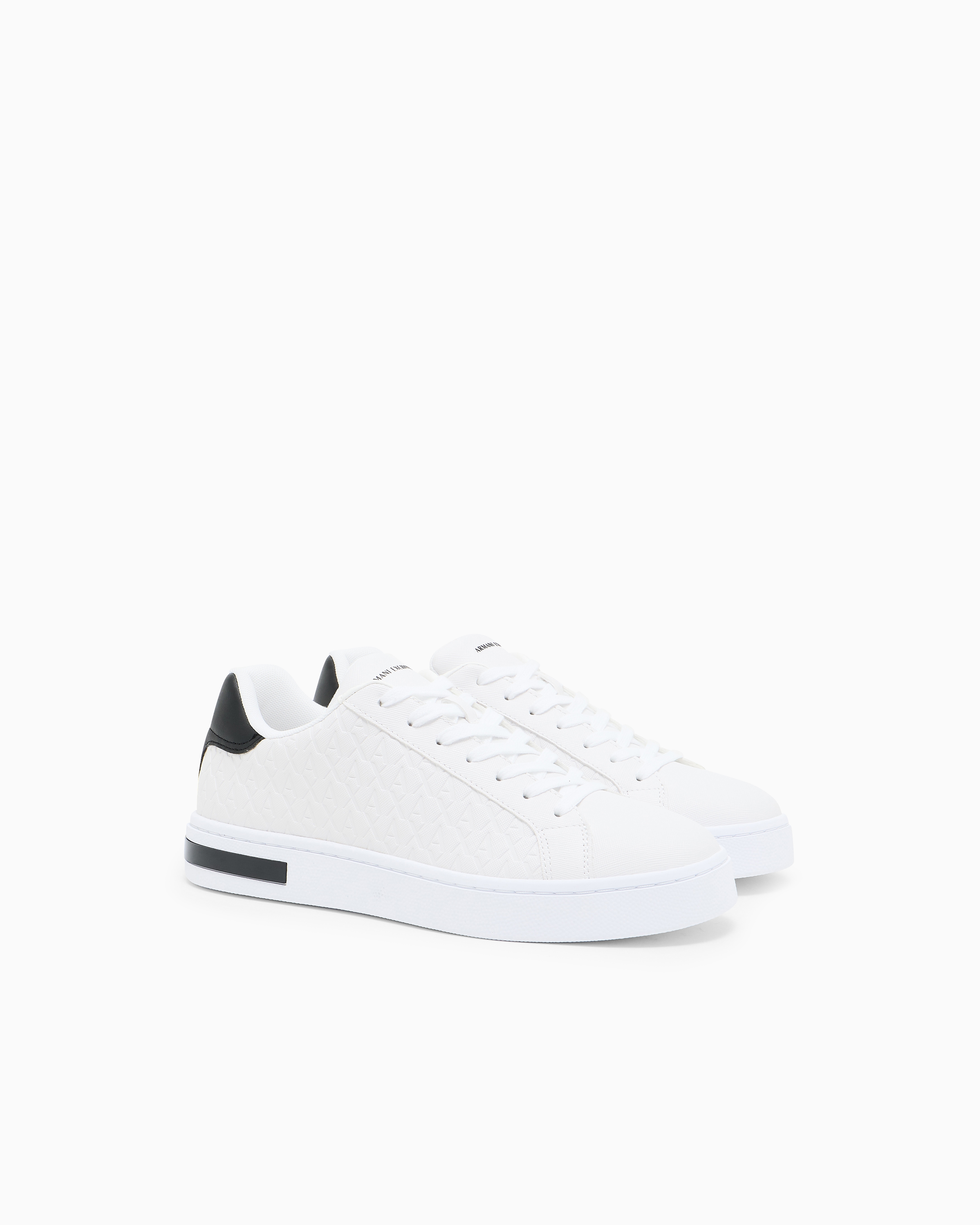Lace-up sneakers with allover embossed logo