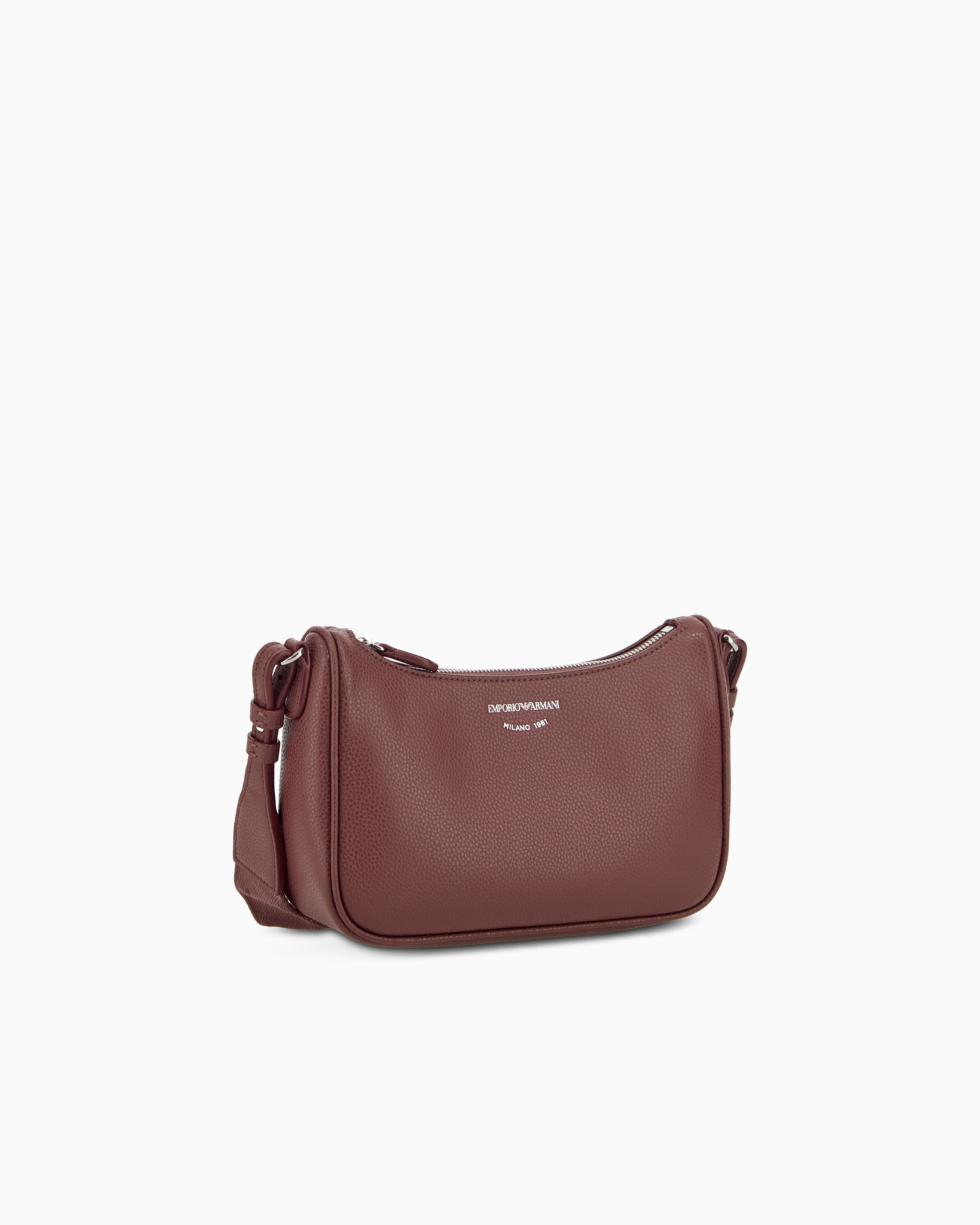 Pebbled shoulder bag with a zip closure and adjustable strap