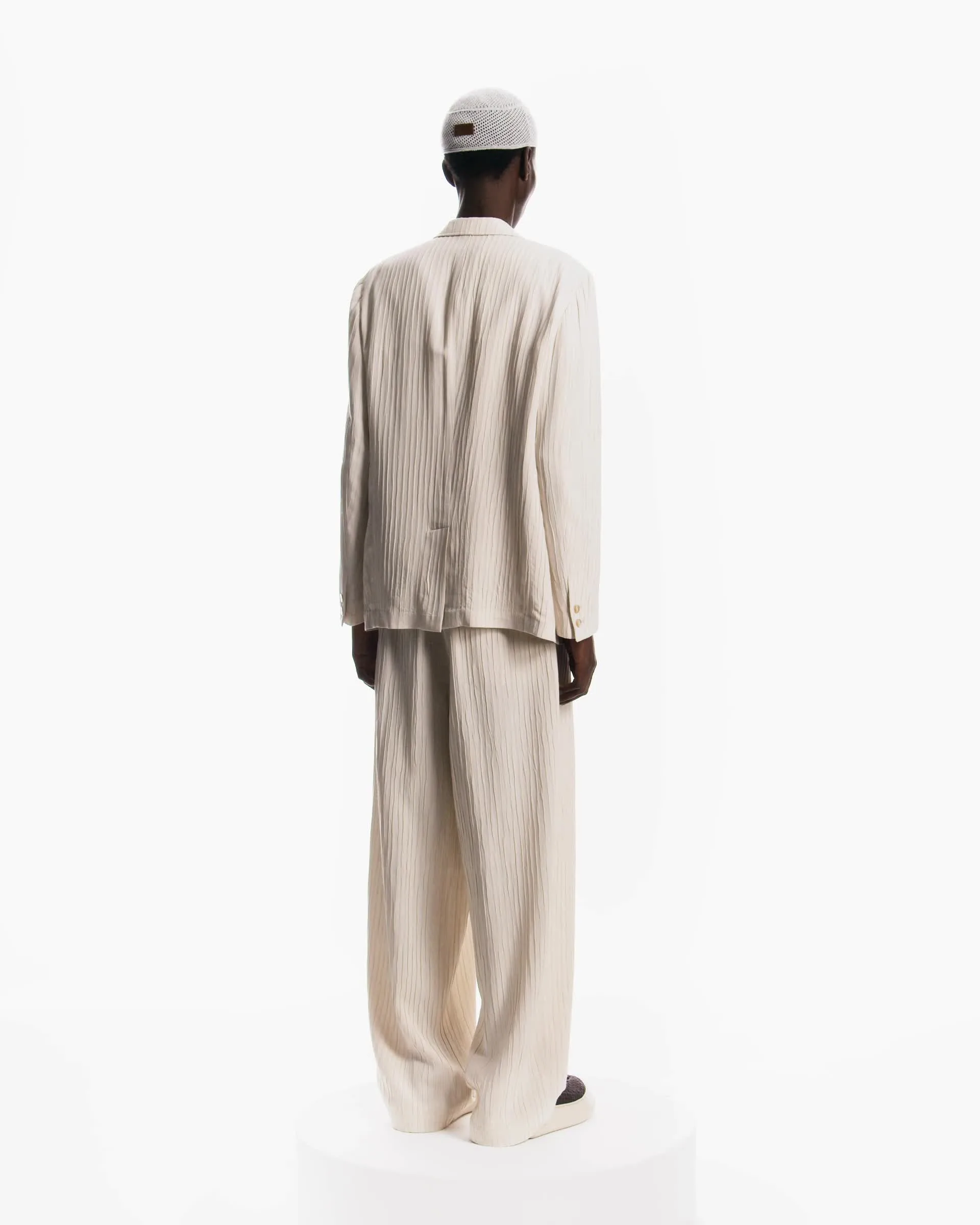 Single-breasted jacket in embossed wrinkle-effect jacquard